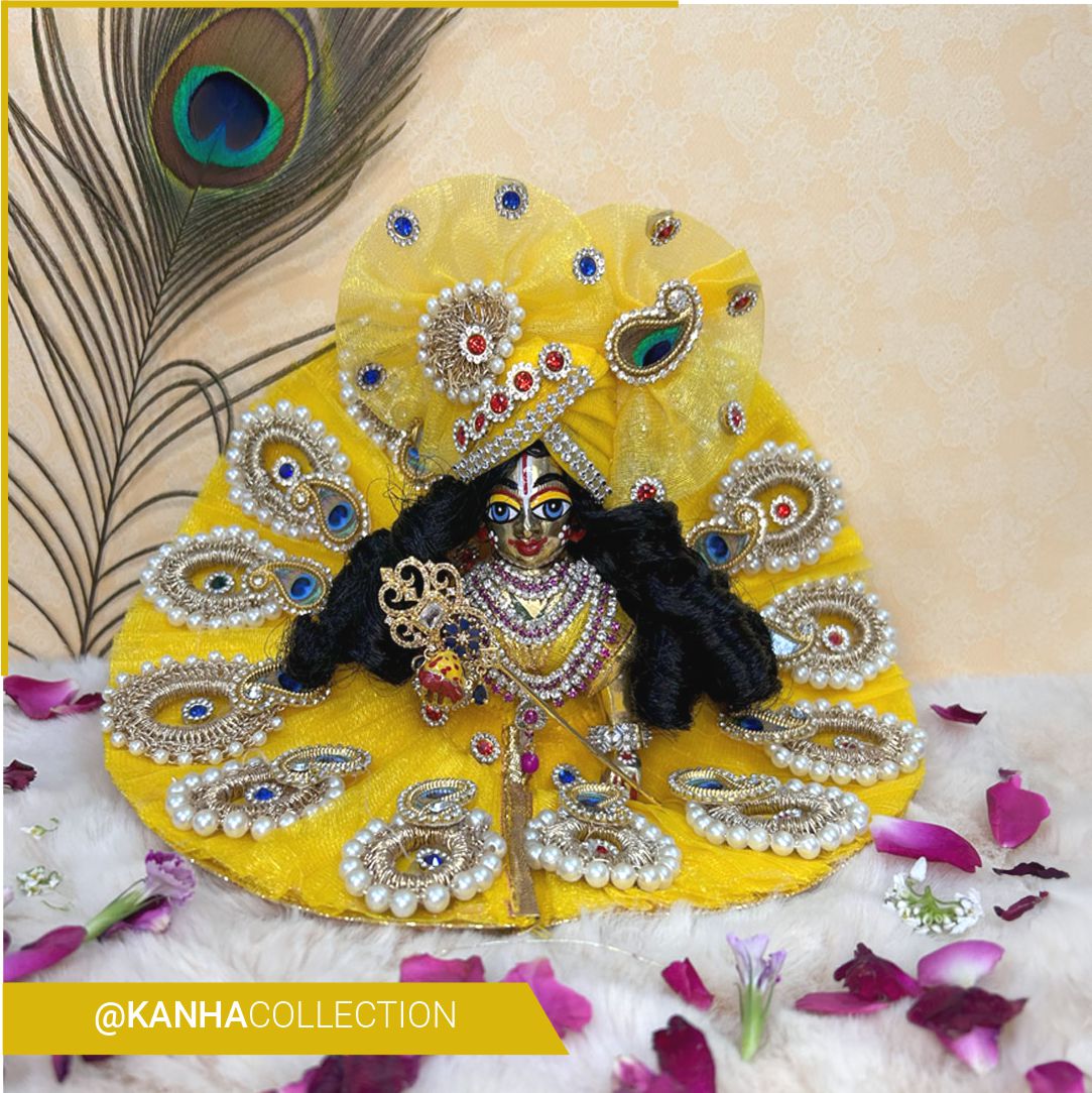 Beautiful yellow dress with pearl stones for janmastmi